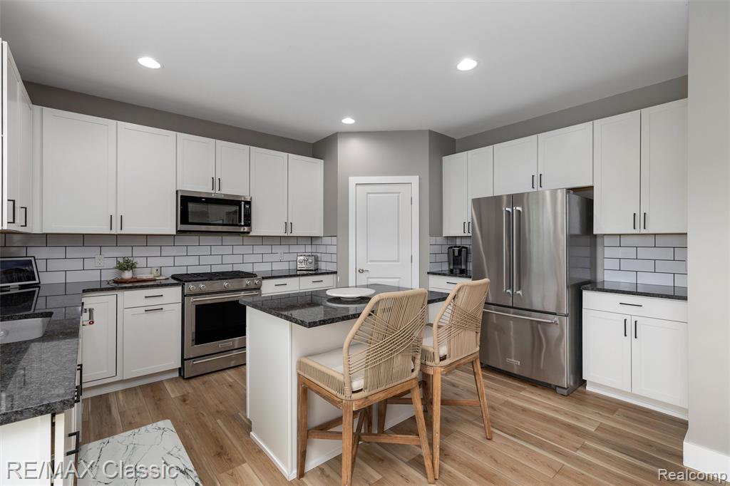 801 Kestrel Court, South Lyon, MI 48178 — Photo 13