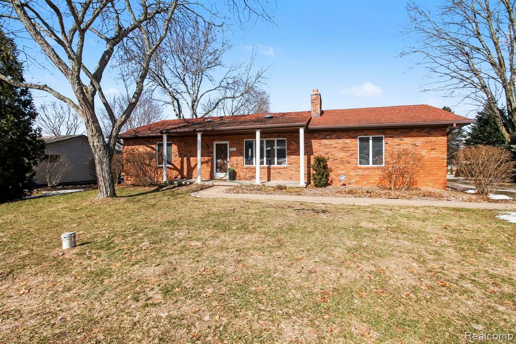8783 SKYLANE Drive, Brighton, MI 48114 — front exterior