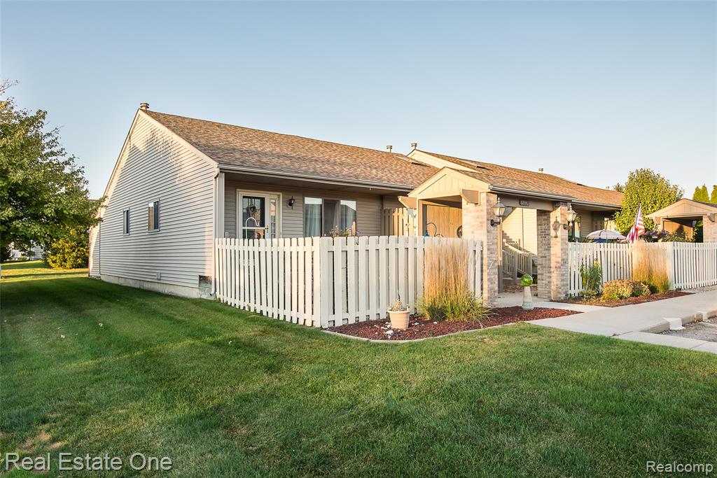62351 ARLINGTON Circle, 1, South Lyon, MI 48178 — front exterior