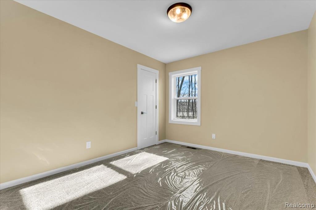 10557 Skeman Road, Brighton, MI 48114 — Photo 11