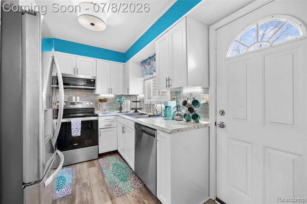704 Estrada Drive, Belleville, MI 48111 — Photo 13