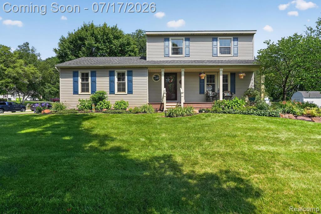 60309 Lamplighter Drive, New Hudson, MI 48165 — front exterior