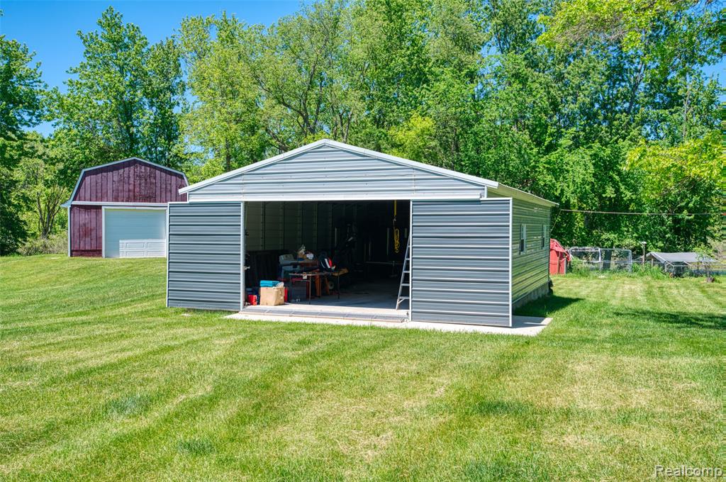 940 Rowland Road, Leonard, MI 48367 — Photo 46