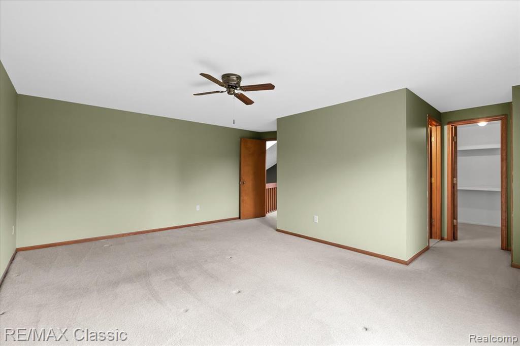 4432 Ravinewood Drive, Commerce Twp, MI 48382 — Photo 25