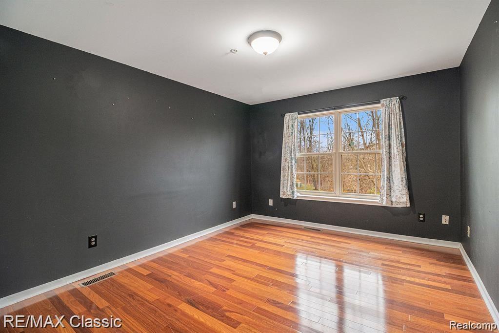 428 Boardwalk Drive, Walled Lake, MI 48390 — Photo 18