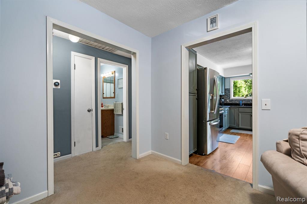971 Tierney, Highland, MI 48356 — Photo 11