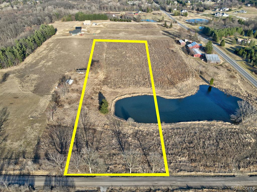9485 irish Road, Goodrich Vlg, MI — front exterior