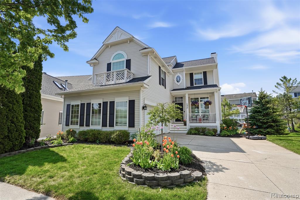 172 Champlain Boulevard, Howell, MI 48843 — front exterior