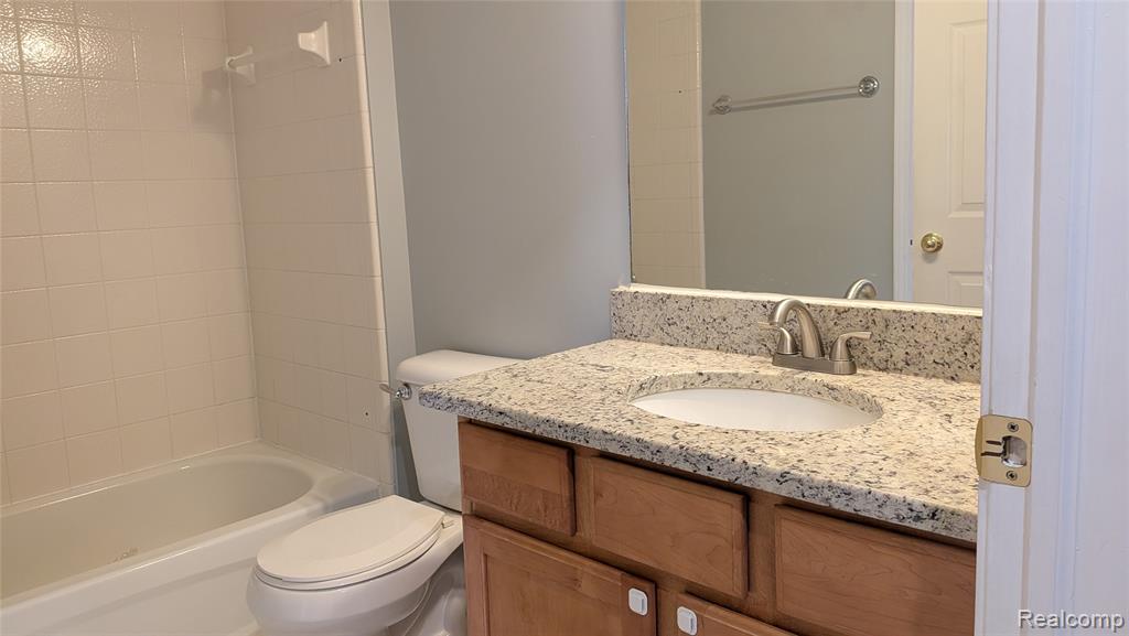 413 VILLAGE Drive, Walled Lake, MI 48390 — Photo 15