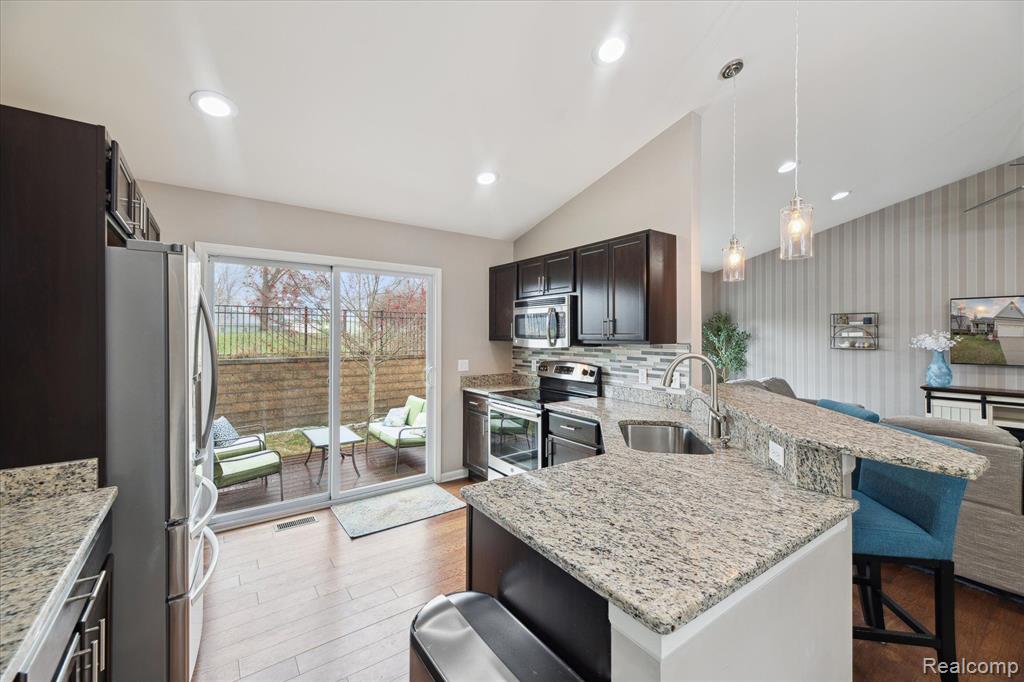 1115 PADDOCK Drive, South Lyon, MI 48178 — Photo 21