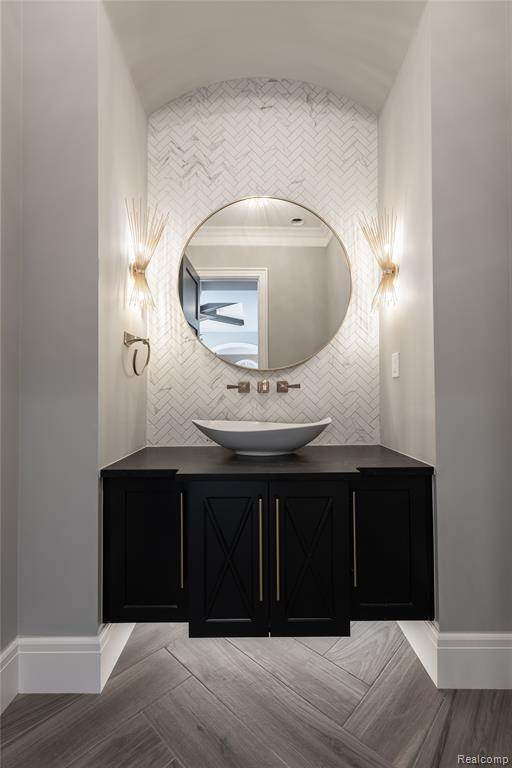 Bathroom featuring vanity and light wood-type flooring