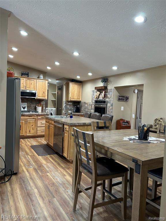 5740 Iroquois Drive, Howell, MI 48843 — Photo 4
