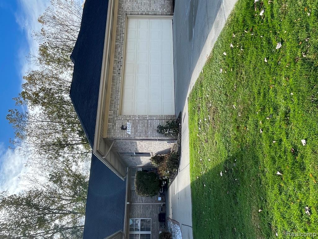 5560 Seabreeze Lane, Sterling Heights, MI 48310 — front exterior