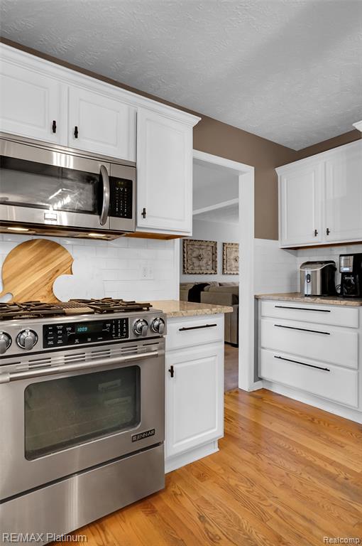8039 Boulder Ridge Court, Brighton, MI 48116 — Photo 13