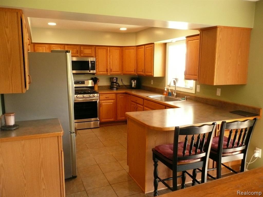 831 DEL SHER Drive, Brighton, MI 48114 — Photo 13