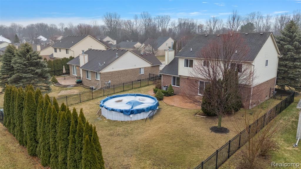 Fenced Backyard with Above Ground Pool