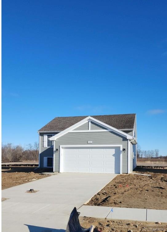 8322 Majestic Boulevard, Fowlerville, MI 48836 — front exterior