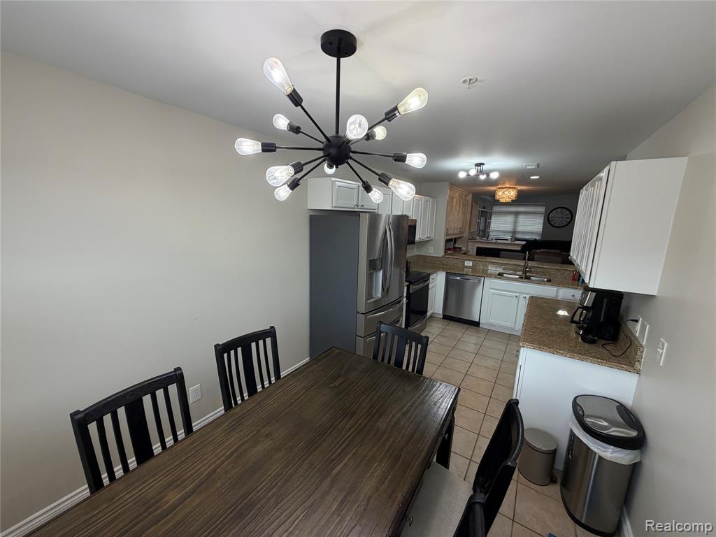 421 Village Drive, Walled Lake, MI 48390 — Photo 14