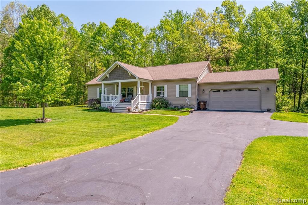 11541 McFall Drive, Willis, MI 48191 — front exterior