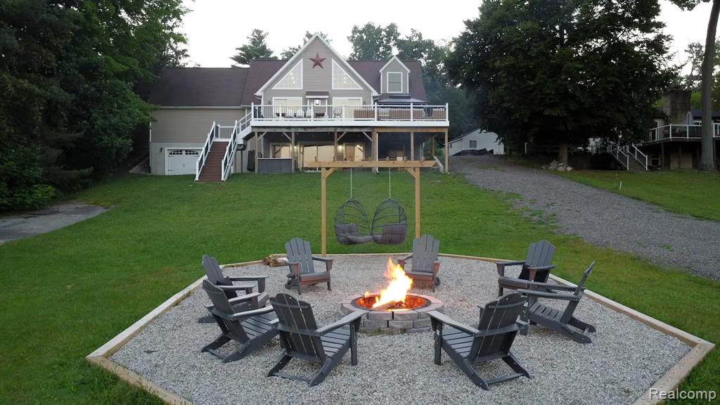 12409 McMurty Drive, Sand Lake, MI 49343 — front exterior
