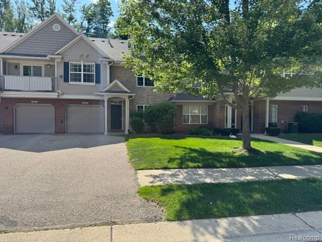 49225 W Woods Drive, 20, Utica, MI 48317 — front exterior