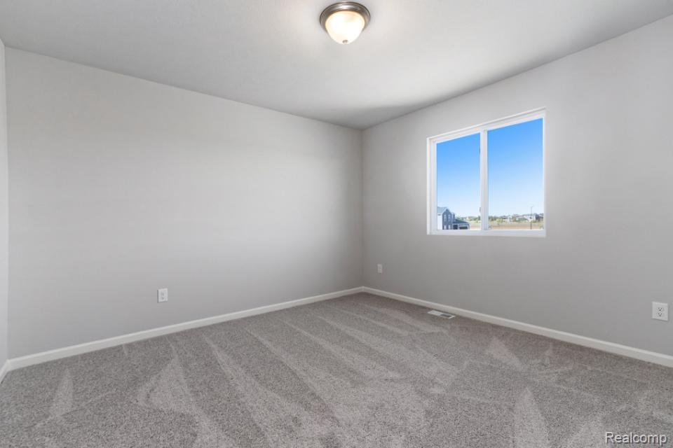 8127 Moonlight Creek Lane, Fowlerville, MI 48836 — Photo 18