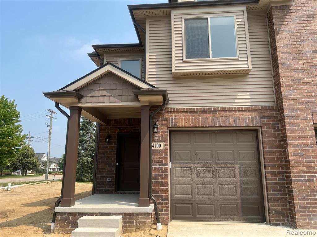 4100 SECLUDED PINES DR, Sterling Heights, MI 48314 — front exterior