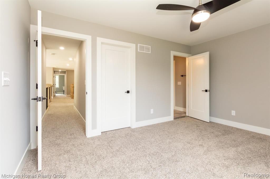 2910 LOON Drive, Wixom, MI 48393 — Photo 73