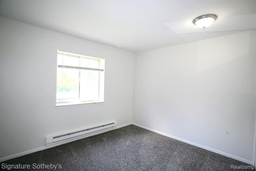 1812 COLONIAL VILLAGE Way, 3, Waterford, MI 48328 — Photo 13