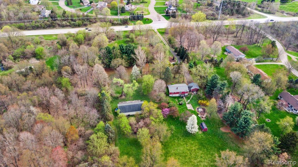7107 E HIGHLAND Road, Howell, MI 48843 — Photo 5