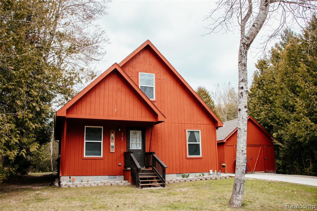 4981 Sherwood Drive, Oscoda, MI 48750 — front exterior