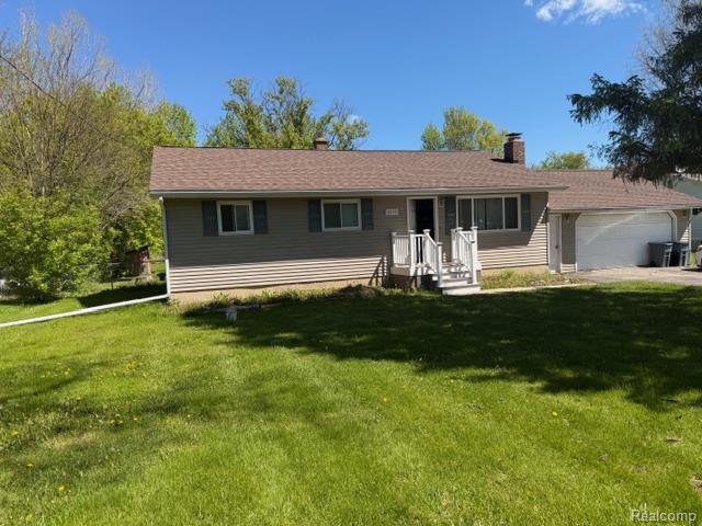 5095 Raymond Avenue, Burton, MI 48509 — front exterior