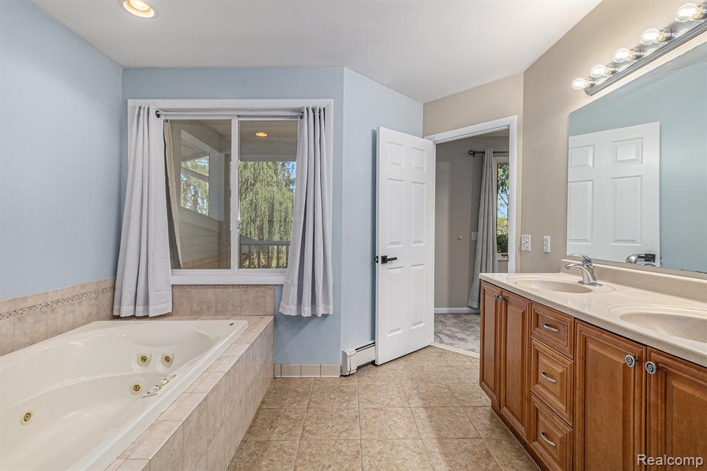 2145 Helmsford Drive, Wolverine Lake, MI 48390 — Photo 29