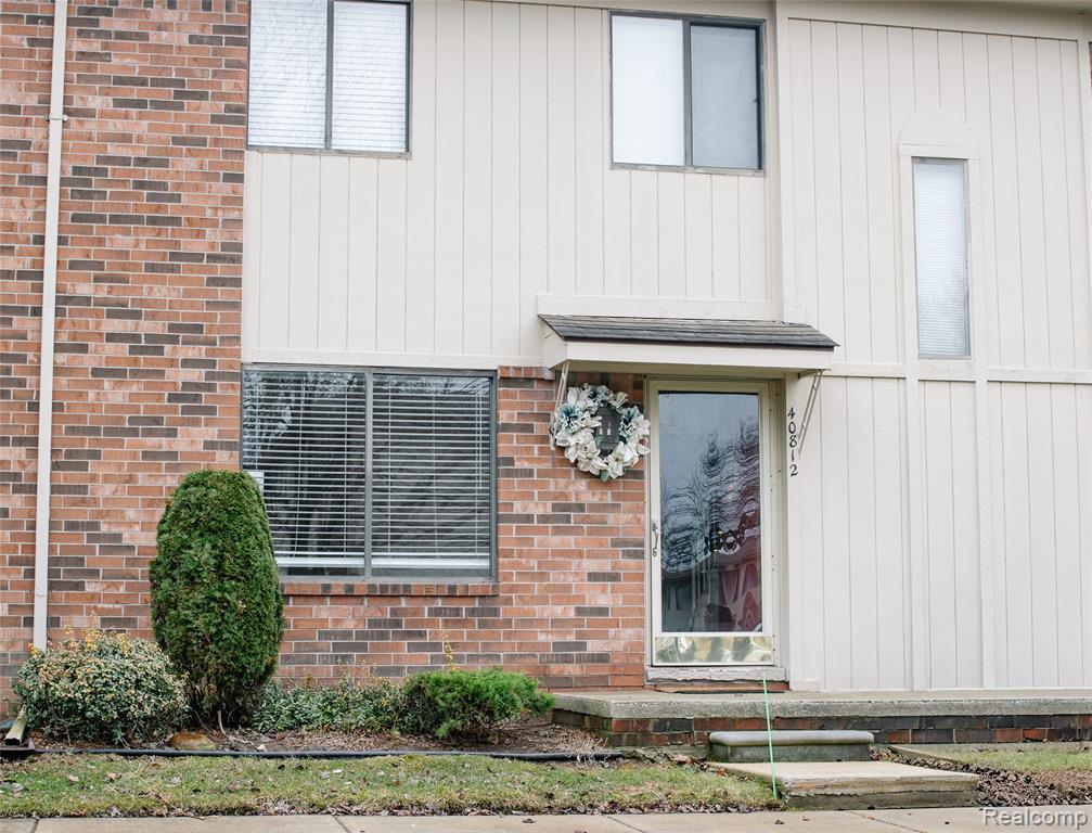 40812 Highpointe Drive, 24, Clinton Twp, MI 48038 — front exterior