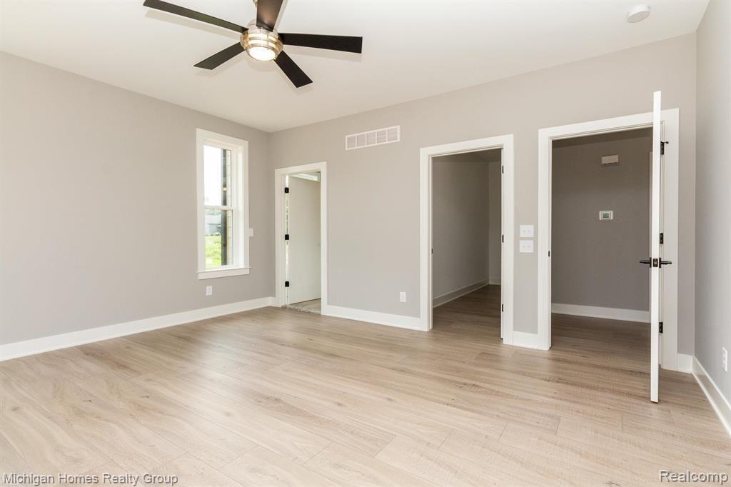 2910 LOON Drive, Wixom, MI 48393 — Photo 68