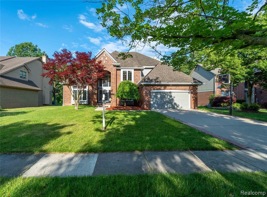 7386 Woodlore Drive, West Bloomfield, MI 48323 — front exterior