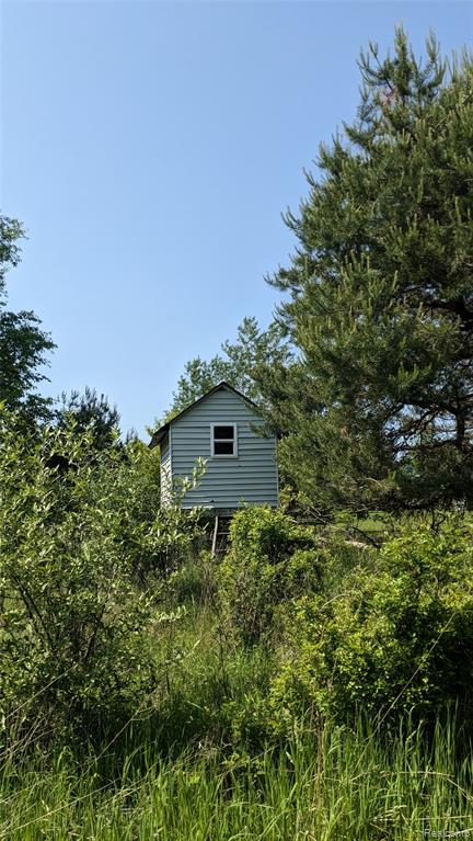 9753 W Coon Lake Road, Webberville, MI 48892 — Photo 64
