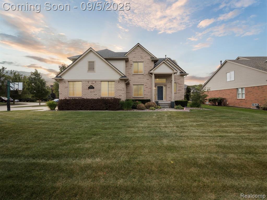 57611 Hawthorn Drive, Washington, MI — front exterior