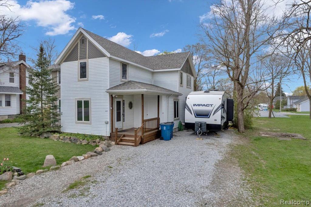 10352 HEGEL Road, Goodrich Vlg, MI — front exterior