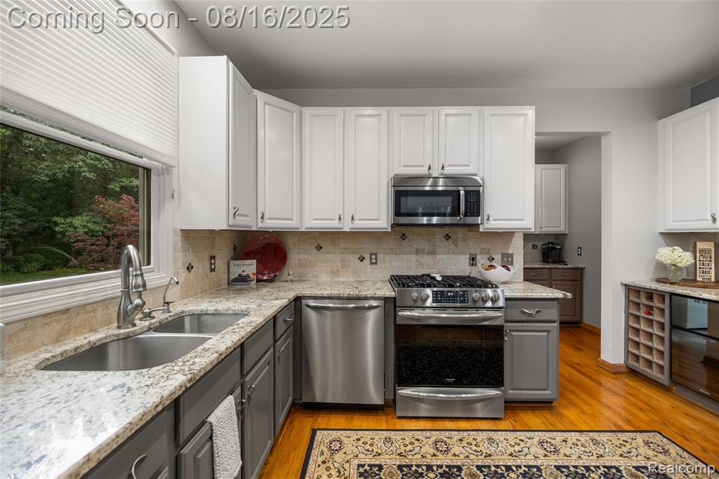 7085 Hickory Hollow Circle, Clarkston, MI 48348 — Photo 17