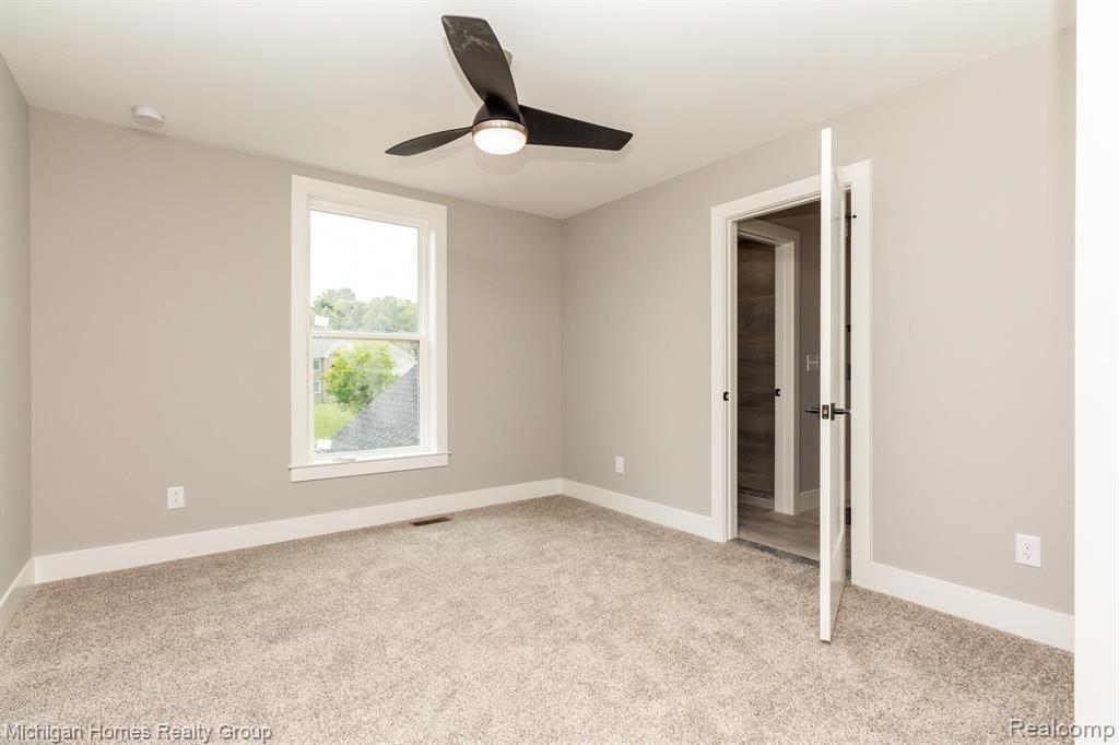 2910 LOON Drive, Wixom, MI 48393 — Photo 22