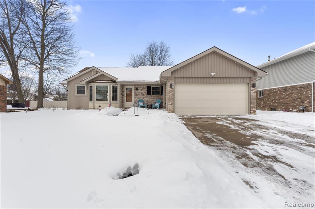21526 E Chipmunk Trail, Woodhaven, MI 48183 — front exterior
