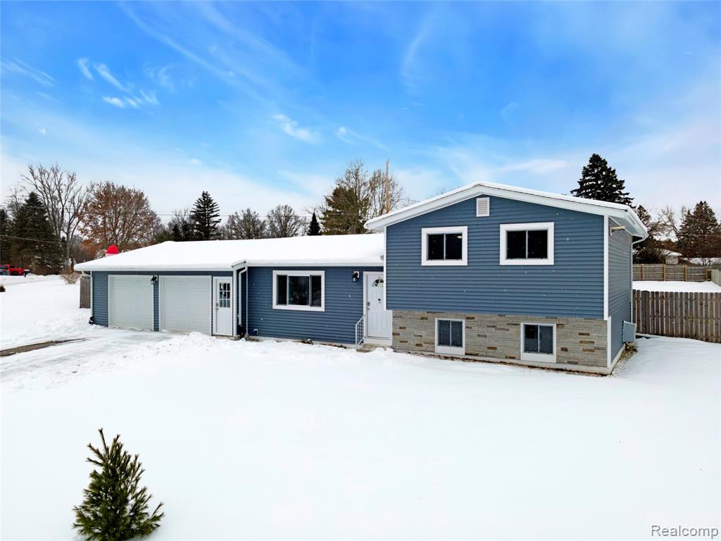 9488 Brookway Court, Goodrich Vlg, MI — front exterior