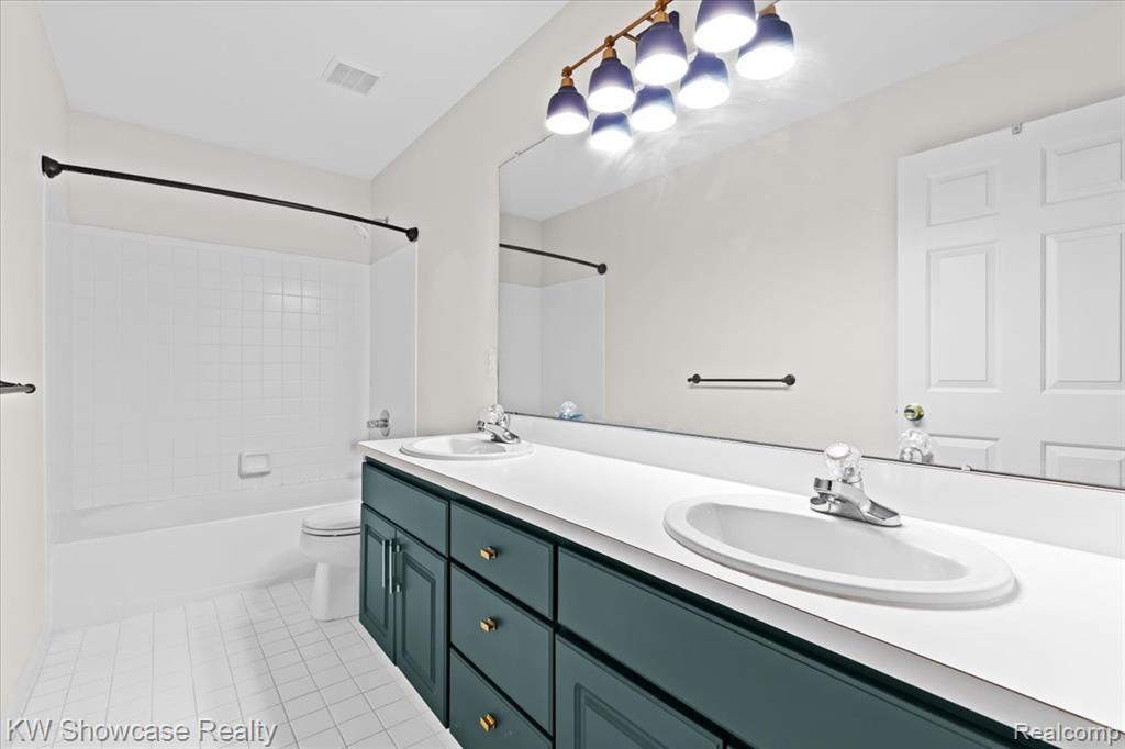 4254 Warrington Drive, Wixom, MI 48393 — Photo 29