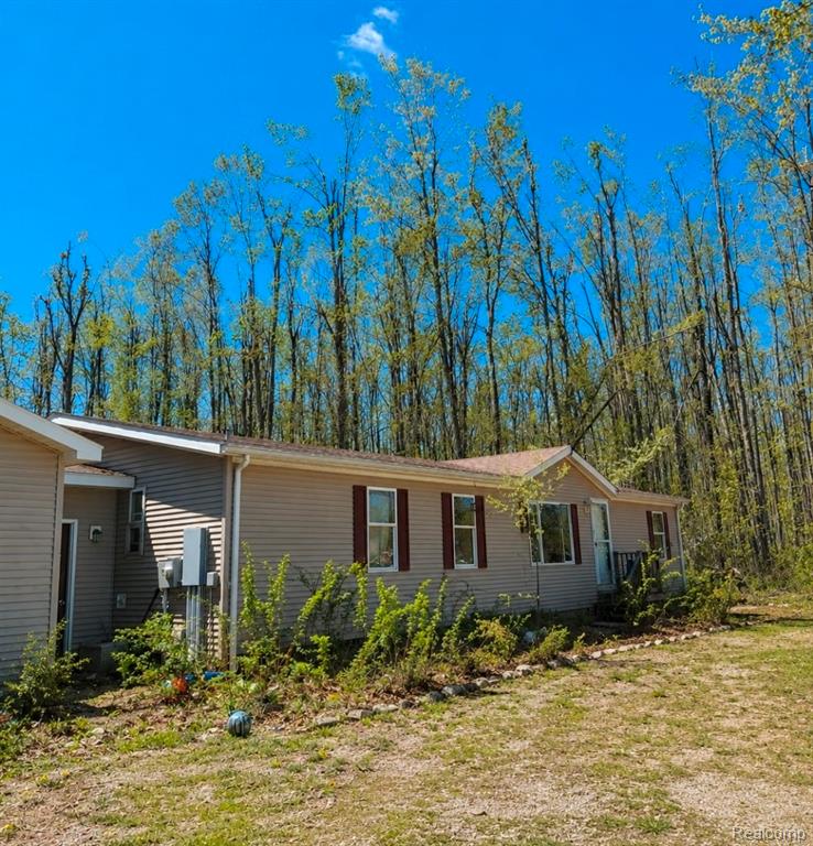 7857 Van Tyle Road, Gaylord, MI 49735 — front exterior