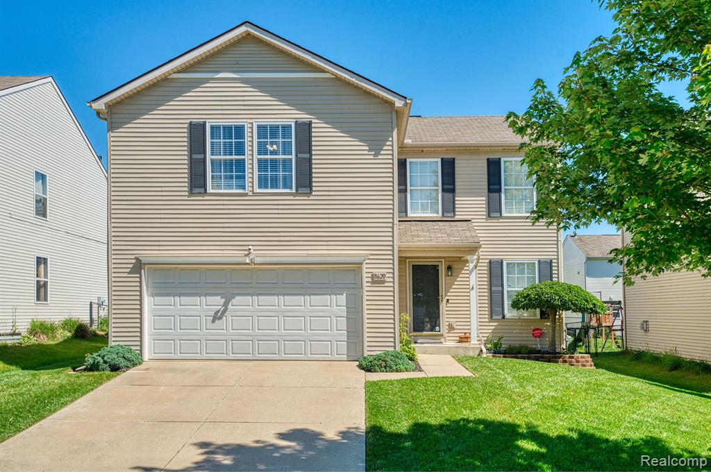 8620 RIFLE RIVER Drive, Fowlerville, MI 48836 — front exterior