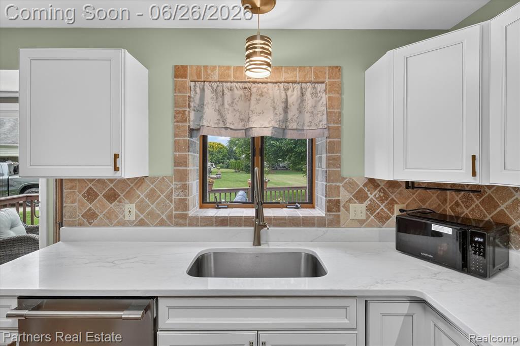 627 W Caledonia Street, Howell, MI 48843 — Photo 18