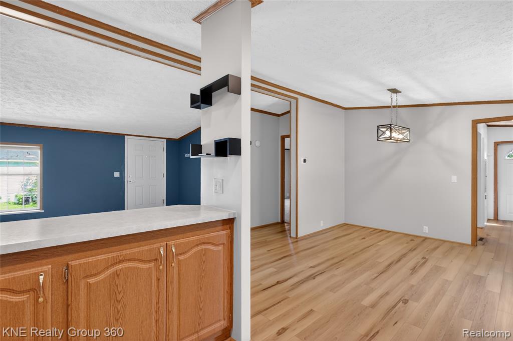 672 Red Oaks Drive, Howell, MI 48843 — Photo 9