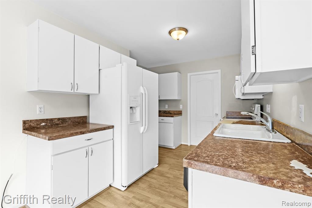 762 Elm Court, Wixom, MI 48393 — Photo 12