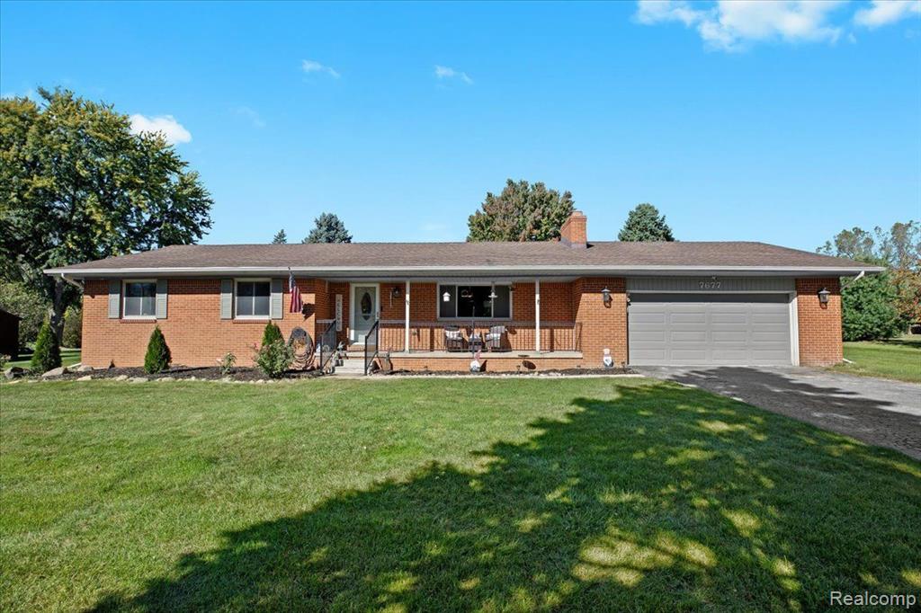 7677 MCCLEMENTS Road, Brighton, MI 48114 — front exterior